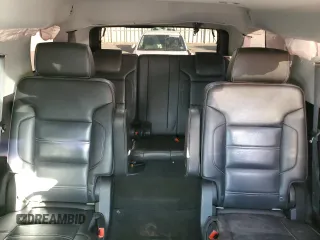 2018 GMC Yukon Denali with VIN 1GKS1CKJ0JR106589, listed as a Copart auction lot 79977034 with 98,022 mi miles and Salvage Title. Bid and sale history available at carsss.com. Image 10.