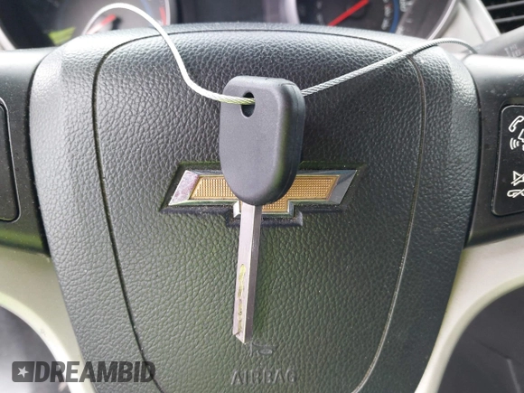 2014 Chevrolet Cruze 1LT z VIN 1G1PC5SBXE7336621, wystawiony jako IAAI lot #42290252 z przebiegiem 184 453 mil mil oraz . Historia ofert i sprzedaży dostępna na DreamBid. Obrazek 11.