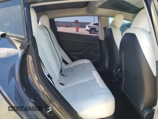 2022 Tesla Model 3 z VIN 5YJ3E1EA5NF124425, wystawiony jako Copart lot #43804405 z przebiegiem 57 412 mil mil oraz Szkoda całkowita • Salvage title. Historia ofert i sprzedaży dostępna na DreamBid. Obrazek 11.