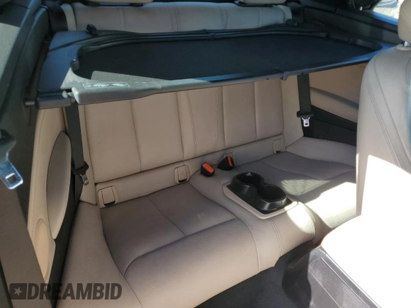 2016 BMW 2 Series 228i xDrive with VIN WBA1L9C55GV324854, listed as a Copart auction lot 77359674 with 101,768 mi miles and Salvage Title. Bid and sale history available at carsss.com. Image 10.