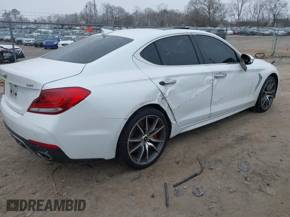 2020 Genesis G70 3.3T with VIN KMTG34LEXLU060919, listed as a IAAI auction lot 41619579 with 69,859 mi miles. Bid and sale history available at carsss.com. Image 4.