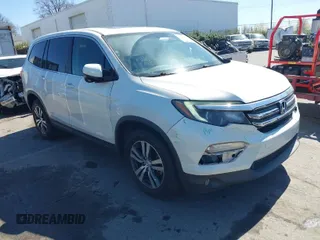 2017 Honda Pilot EX-L with VIN 5FNYF5H56HB048081, listed as a IAAI auction lot 41781054 with 124,450 mi miles. Bid and sale history available at carsss.com. Image 1.