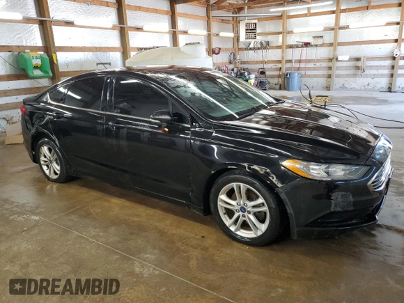 2018 Ford Fusion SE z VIN 3FA6P0H77JR277923, wystawiony jako Copart lot #56897455 z przebiegiem 154 432 mil mil oraz Czysty tytuł • Clean title. Historia ofert i sprzedaży dostępna na DreamBid. Obrazek 4.