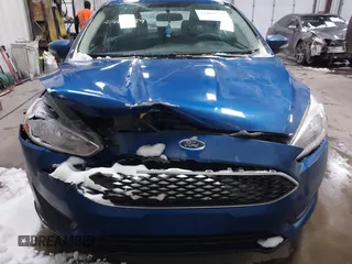 2018 Ford Focus SE z VIN 1FADP3F26JL312725, wystawiony jako IAAI lot #41488559 z przebiegiem 30 686 mil mil oraz . Historia ofert i sprzedaży dostępna na DreamBid. Obrazek 12.