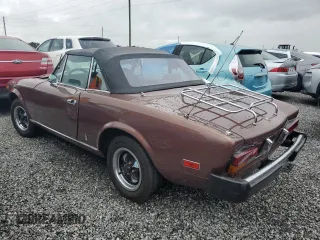 1979 FIAT 124 Spider z VIN 124CS20146682, wystawiony jako Copart lot #73923954 z przebiegiem 83 258 mil mil oraz Szkoda całkowita • Salvage title. Historia ofert i sprzedaży dostępna na DreamBid. Obrazek 2.