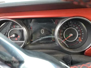 2021 Jeep Gladiator Rubicon with VIN 1C6JJTBG4ML504141, listed as a Copart auction lot 43367565 with 56,879 mi miles and Salvage title. Bid and sale history available at DreamBid. Image 9.