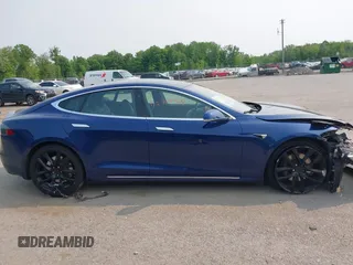 2017 Tesla Model S 100D with VIN 5YJSA1E27HF192505, listed as a IAAI auction lot 42409365 with 111,881 mi miles and . Bid and sale history available at DreamBid. Image 13.