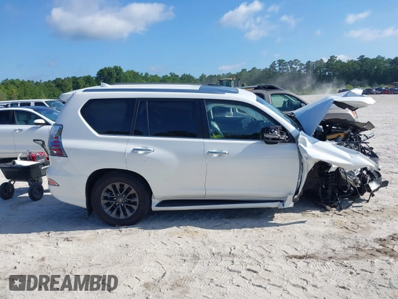 2021 Lexus GX 460 Premium with VIN JTJAM7BX0M5302132, listed as a IAAI auction lot 42462529 with 57,564 mi miles and . Bid and sale history available at DreamBid. Image 13.