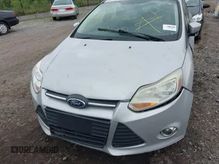 2012 Ford Focus SE with VIN 1FAHP3F29CL353872, listed as a IAAI auction lot 42528943 with Not provided miles and . Bid and sale history available at DreamBid. Image 12.