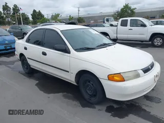 1997 Mazda Protege DX with VIN JM1BC1417V0156858, listed as a IAAI auction lot 42118339 with 187,673 mi miles and . Bid and sale history available at DreamBid. Image 1.