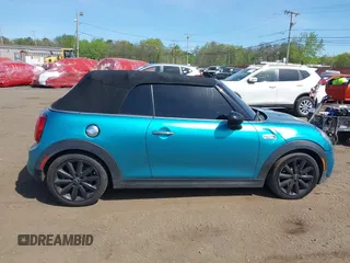 2019 MINI Convertible Cooper S с VIN WMWWG9C54K3E41195, выставлен на аукционе IAAI как лот 42149191 с пробегом 80 033 миль миль и . История ставок и продаж доступна на DreamBid. Изображение 13.