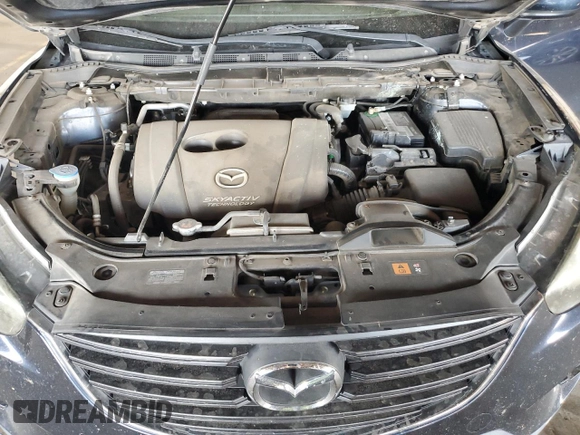 2016 Mazda CX-5 Touring with VIN JM3KE2CY7G0653854, listed as a Copart auction lot 74825564 with 139,193 mi miles and Salvage Title. Bid and sale history available at DreamBid. Image 11.