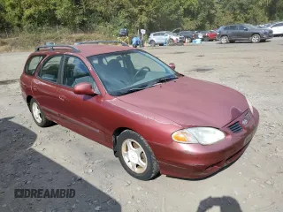 1999 Hyundai Elantra z VIN KMHJW35F0XU129498, wystawiony jako Copart lot #74481134 z przebiegiem 72 123 mil mil oraz Czysty tytuł • Clean title. Historia ofert i sprzedaży dostępna na DreamBid. Obrazek 4.