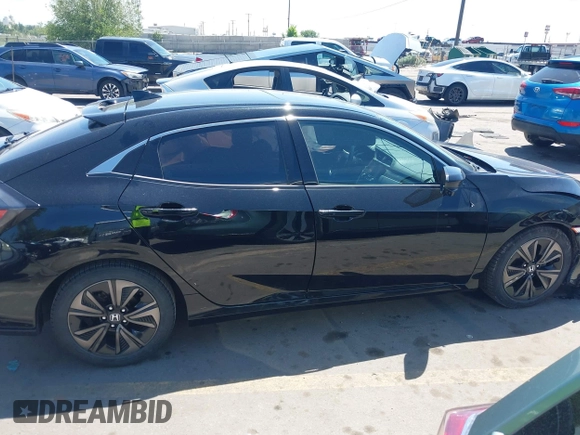 2018 Honda Civic EX z VIN SHHFK7H57JU230455, wystawiony jako IAAI lot #42328392 z przebiegiem 86 867 mil mil oraz . Historia ofert i sprzedaży dostępna na DreamBid. Obrazek 13.