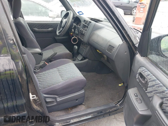 1999 Toyota RAV4 with VIN JT3GP10VXX7061972, listed as a IAAI auction lot 42474051 with 229,406 mi miles and . Bid and sale history available at DreamBid. Image 5.