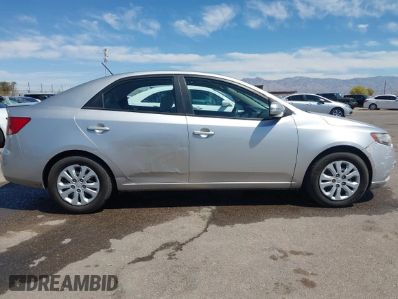 2010 Kia Forte EX with VIN KNAFU4A29A5195670, listed as a IAAI auction lot 42075961 with 160,648 mi miles. Bid and sale history available at carsss.com. Image 13.