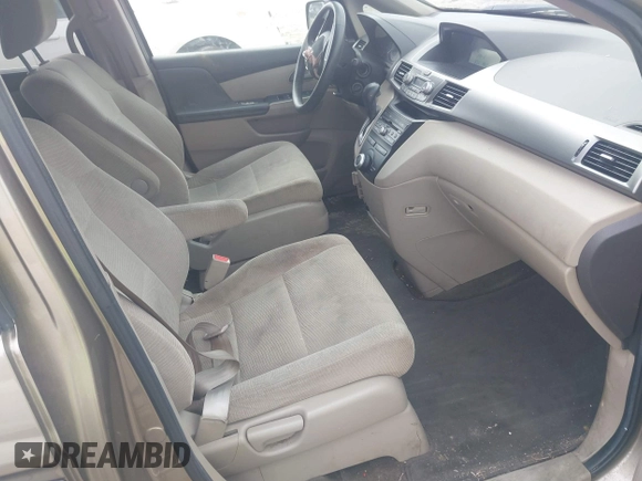 2012 Honda Odyssey LX z VIN 5FNRL5H25CB019912, wystawiony jako IAAI lot #41458224 z przebiegiem 158 980 mil mil oraz . Historia ofert i sprzedaży dostępna na DreamBid. Obrazek 5.