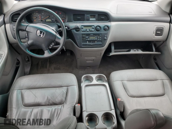 2002 Honda Odyssey EX-L with VIN 2HKRL18902H506828, listed as a Copart auction lot 53735625 with 214,446 mi miles and Salvage title. Bid and sale history available at DreamBid. Image 8.