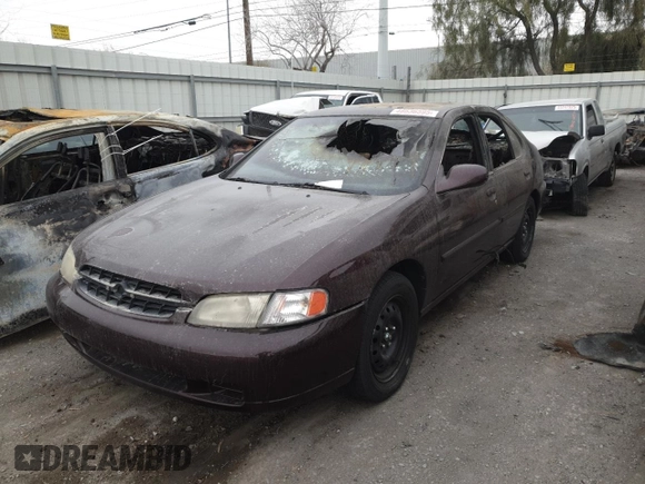 1998 Nissan Altima XE with VIN 1N4DL01D8WC266874, listed as a Copart auction lot 48636595 with 0 mi miles and Salvage Title. Bid and sale history available at carsss.com. Image 1.