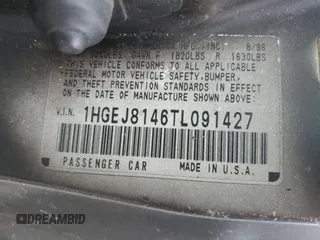 1996 Honda Civic EX z VIN 1HGEJ8146TL091427, wystawiony jako Copart lot #53537235 z przebiegiem 132 490 mil mil oraz Szkoda całkowita • Salvage title. Historia ofert i sprzedaży dostępna na DreamBid. Obrazek 13.
