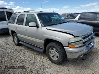 2004 Chevrolet Tahoe LS z VIN 1GNEC13T34R228124, wystawiony jako Copart lot #57317335 z przebiegiem 198 495 mil mil oraz Szkoda całkowita • Salvage title. Historia ofert i sprzedaży dostępna na DreamBid. Obrazek 4.