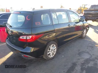 2014 Mazda 5 Sport with VIN JM1CW2BL1E0163682, listed as a IAAI auction lot 41344215 with 63,811 mi miles and . Bid and sale history available at carsss.com. Image 4.