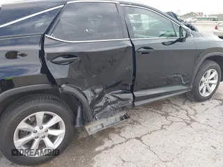 2016 Lexus RX 350 z VIN 2T2BZMCA4GC017342, wystawiony jako IAAI lot #42357093 z przebiegiem 142 515 mil mil oraz . Historia ofert i sprzedaży dostępna na DreamBid. Obrazek 6.