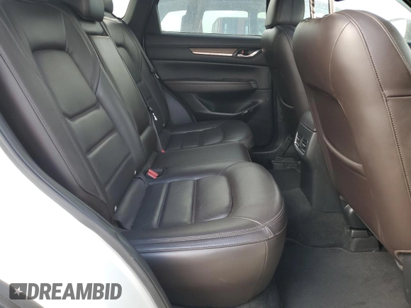 2019 Mazda CX-5 Signature with VIN JM3KFBEYXK0537826, listed as a Copart auction lot 50063015 with 76,448 mi miles and Salvage Title. Bid and sale history available at carsss.com. Image 11.