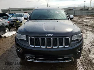 2016 Jeep Grand Cherokee Overland with VIN 1C4RJFCG8GC402339, listed as a Copart auction lot 47553385 with 121,486 mi miles and Salvage title. Bid and sale history available at DreamBid. Image 5.