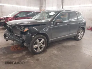 2012 Volkswagen Touareg Sport with VIN WVGEF9BP8CD009511, listed as a IAAI auction lot 41457989 with 87,325 mi miles and . Bid and sale history available at DreamBid. Image 2.