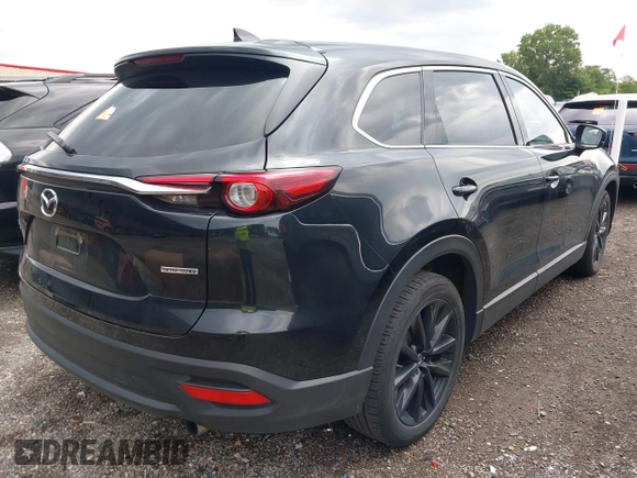2023 Mazda CX-9 Touring Plus with VIN JM3TCBAY2P0657825, listed as a IAAI auction lot 42756562 with 52,090 mi miles and . Bid and sale history available at DreamBid. Image 4.