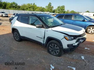 2021 Jeep Compass Trailhawk with VIN 3C4NJDDB2MT583833, listed as a Copart auction lot 58736675 with 67,090 mi miles and Salvage title. Bid and sale history available at DreamBid. Image 4.