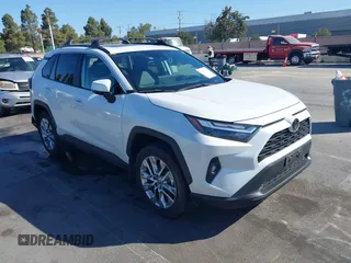2023 Toyota RAV4 XLE Premium with VIN 2T3C1RFV7PW299428, listed as a IAAI auction lot 42527306 with 9,853 mi miles and . Bid and sale history available at DreamBid. Image 1.