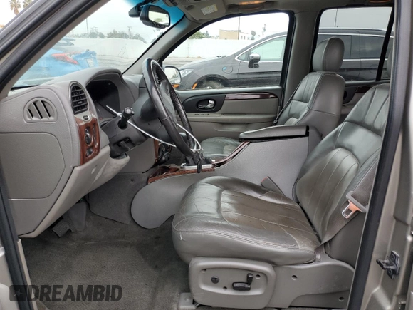 2003 GMC Envoy SLE with VIN 1GKDS13S232236886, listed as a Copart auction lot 43220545 with 58,229 mi miles and Salvage Title. Bid and sale history available at carsss.com. Image 7.