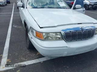 2001 Mercury Grand Marquis LS with VIN 2MEFM75W71X614856, listed as a IAAI auction lot 42195921 with 113,352 mi miles and . Bid and sale history available at DreamBid. Image 6.