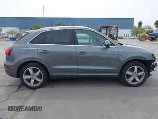 2015 Audi Q3 Premium Plus with VIN WA1EFCFSXFR009768, listed as a IAAI auction lot 41974476 with 53,013 mi miles and . Bid and sale history available at DreamBid. Image 14.