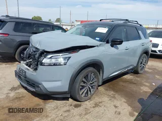 2022 Nissan Pathfinder Platinum with VIN 5N1DR3DH7NC216826, listed as a IAAI auction lot 41888575 with 71,663 mi miles and . Bid and sale history available at DreamBid. Image 2.