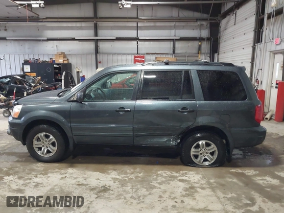 2005 Honda Pilot EX-L z VIN 2HKYF18715H564632, wystawiony jako IAAI lot #41685668 z przebiegiem 253 495 mil mil oraz . Historia ofert i sprzedaży dostępna na DreamBid. Obrazek 14.