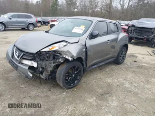 2013 Nissan Juke S with VIN JN8AF5MR9DT213627, listed as a IAAI auction lot 41132886 with 111,453 mi miles. Bid and sale history available at carsss.com. Image 2.