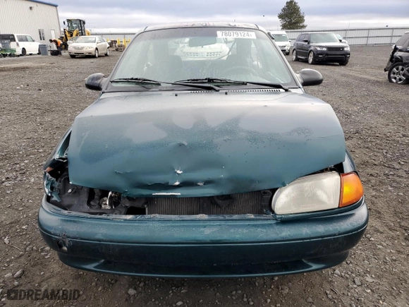 1995 Ford Aspire with VIN KNJLT05H6S6157368, listed as a Copart auction lot 78079124 with NaN miles and Salvage Title. Bid and sale history available at carsss.com. Image 5.