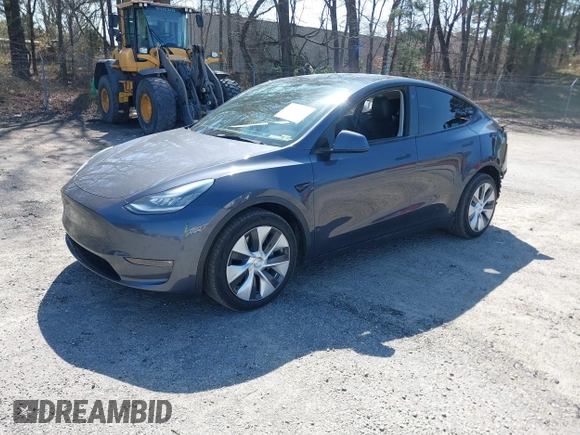 2021 Tesla Model Y Long Range with VIN 5YJYGDEE4MF119249, listed as a IAAI auction lot 41764711 with 87,796 mi miles. Bid and sale history available at carsss.com. Image 2.