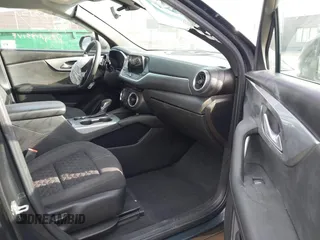 2020 Chevrolet Blazer LT z VIN 3GNKBBRA9LS595817, wystawiony jako IAAI lot #41833151 z przebiegiem 104 486 mil mil oraz . Historia ofert i sprzedaży dostępna na DreamBid. Obrazek 5.
