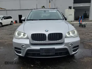 2012 BMW X5 35i with VIN 5UXZV4C57CL747717, listed as a Copart auction lot 63003135 with 135,999 mi miles and Clean title. Bid and sale history available at DreamBid. Image 5.