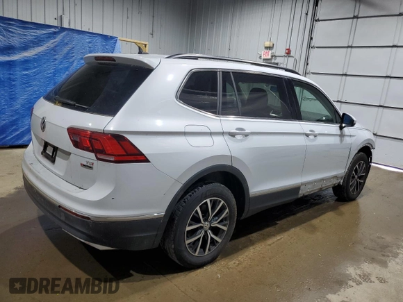 2018 Volkswagen Tiguan SEL with VIN 3VV2B7AX9JM197161, listed as a Copart auction lot 59836195 with 111,195 mi miles and Salvage title. Bid and sale history available at DreamBid. Image 3.