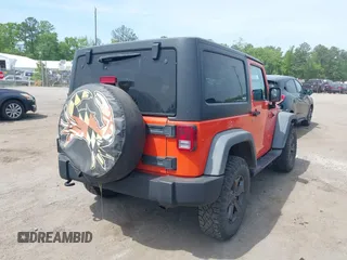 2015 Jeep Wrangler Sport with VIN 1C4AJWAG7FL667462, listed as a IAAI auction lot 42134109 with 85,651 mi miles and . Bid and sale history available at carsss.com. Image 4.