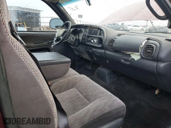 2001 Dodge 1500 z VIN 3B7HC13Z21M257475, wystawiony jako Copart lot #49248635 z przebiegiem 228 198 mil mil oraz Szkoda całkowita • Salvage title. Historia ofert i sprzedaży dostępna na DreamBid. Obrazek 7.