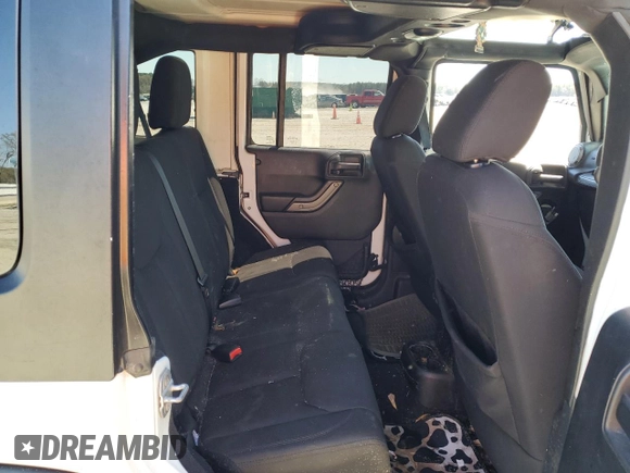 2015 Jeep Wrangler Unlimited Sport RHD with VIN 1C4BJWKG0FL690763, listed as a Copart auction lot 48823714 with 156,714 mi miles and Salvage title. Bid and sale history available at DreamBid. Image 10.