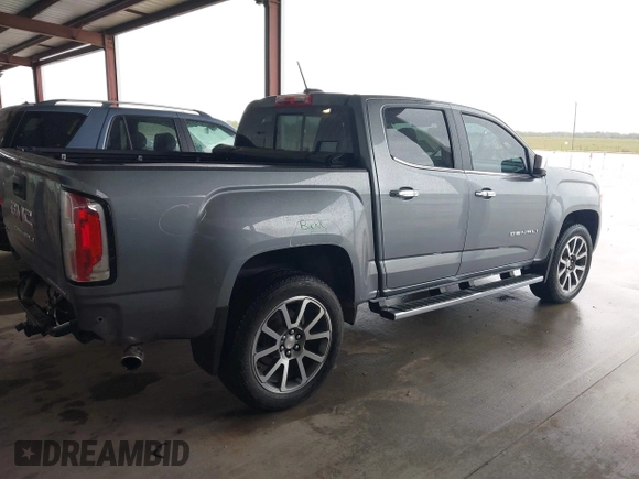 2022 GMC Canyon 2WD Denali with VIN 1GTG5EEN4N1114408, listed as a IAAI auction lot 41908815 with 34,730 mi miles. Bid and sale history available at carsss.com. Image 4.