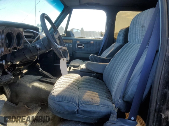 1991 Chevrolet Suburban z VIN 1GNGV26K1MF104219, wystawiony jako Copart lot #87527045 z przebiegiem 189 345 mil mil oraz Czysty tytuł • Clean title. Historia ofert i sprzedaży dostępna na DreamBid. Obrazek 7.
