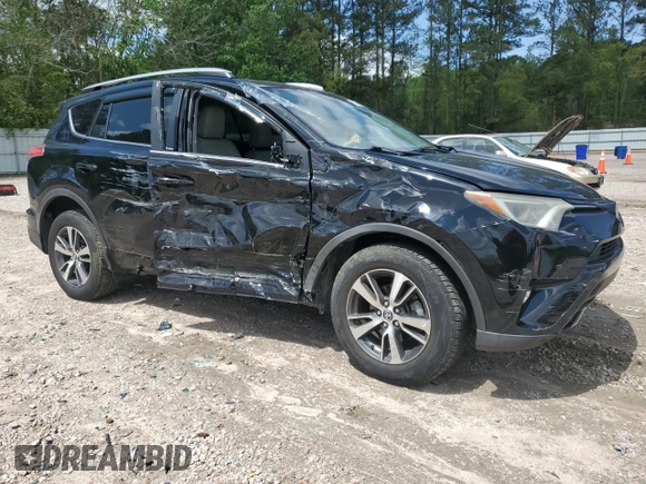 2018 Toyota RAV4 XLE with VIN 2T3RFREV7JW697470, listed as a Copart auction lot 52192305 with 109,420 mi miles and Salvage Title. Bid and sale history available at carsss.com. Image 4.